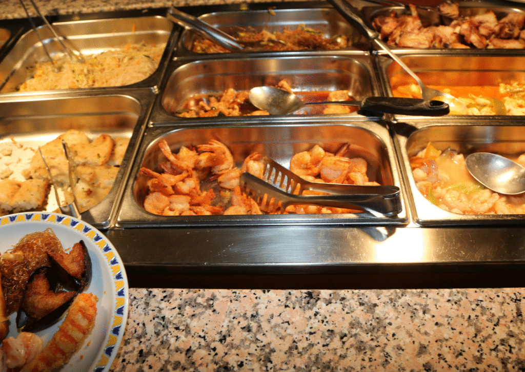 Current image: Meals on different trays in an all-you-can-eat restaurant