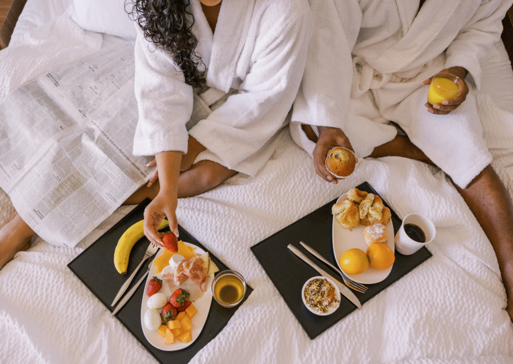 Current image: a couple eating room service